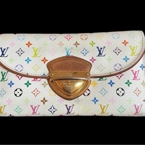 LV Murakami wallet, in great used condition.  She’s pretty and rare!